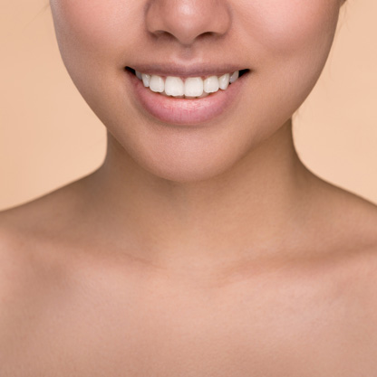 close-up-of-smiling-woman-with-firm-skin