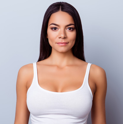 woman-in-white-tank-top-on-grey-background
